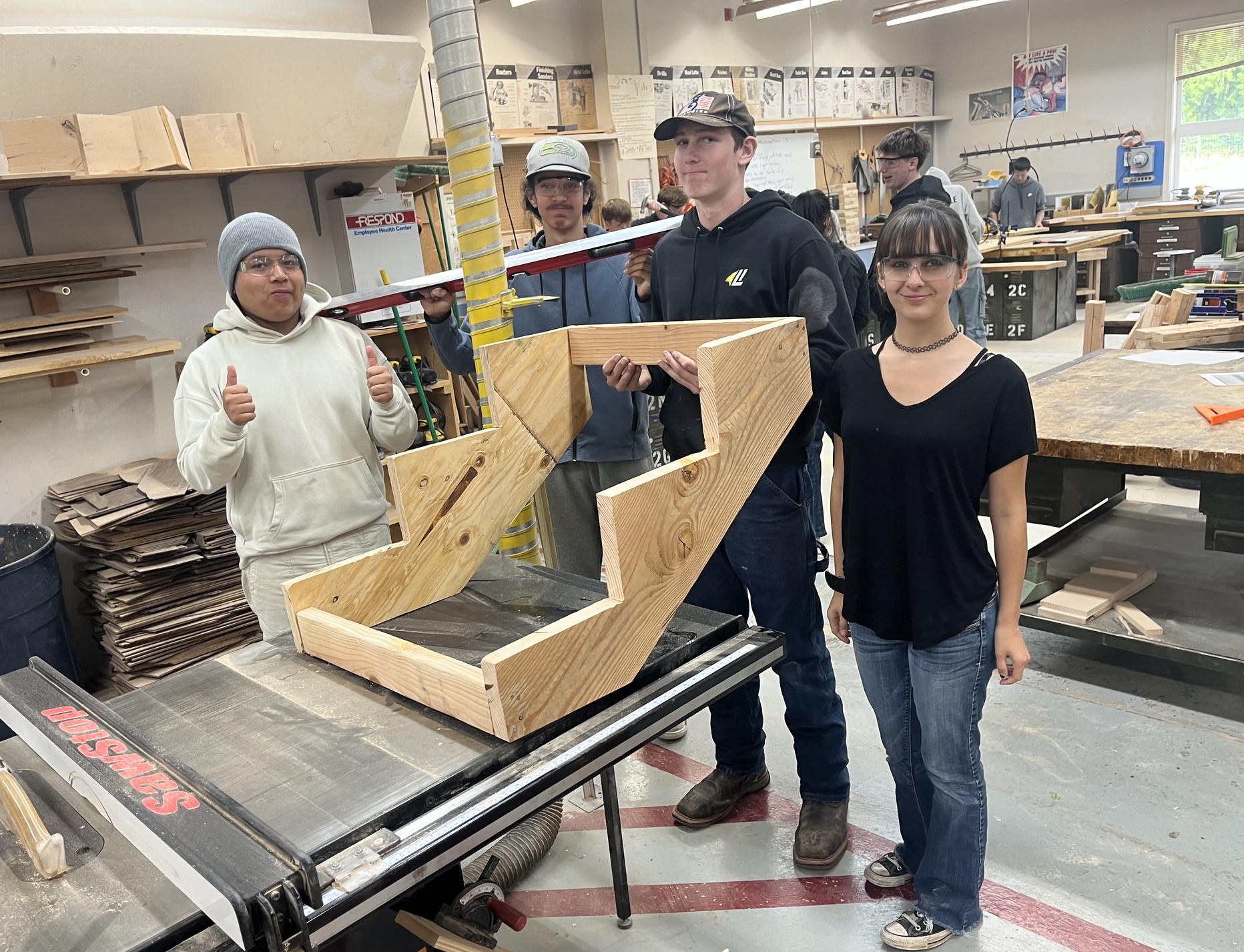 Image of students applying math to construction